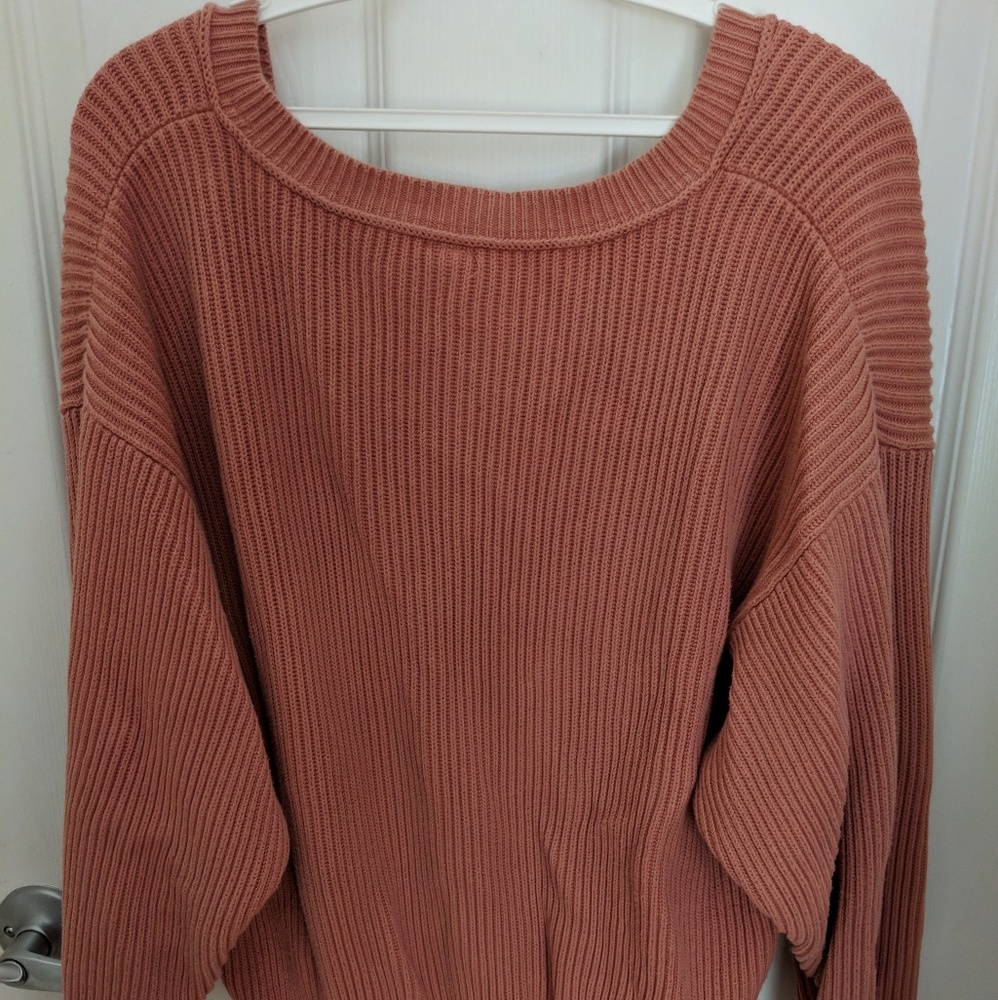 Medium size, pink Free People sweater.